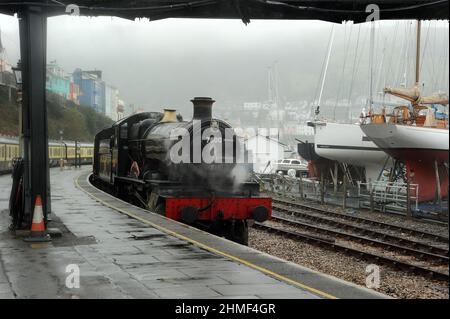 'Lydham Manor' (running as class pioneer 7800 'Torquay Manor') at Kingswear Station. Stock Photo