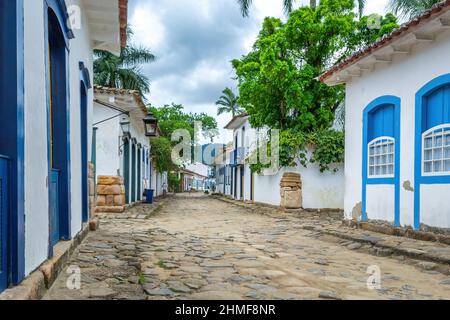 Cobblestone street and traditional old building architecture in Paraty. Paraty is a Portuguese style colonial village or town which is an important to Stock Photo