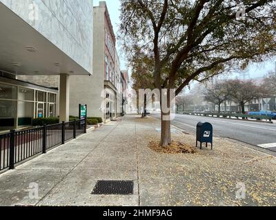 Augusta, Ga USA - 12 09 21: Downtown Augusta Ga morning fog and sidewalk Stock Photo