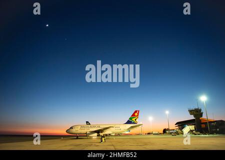 South African Airline on tarmac at sunrise, airport, Windhoek, Namibia Stock Photo