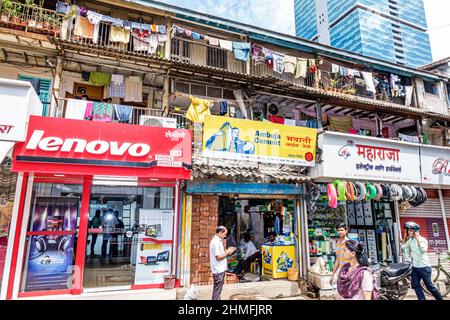 Mumbai India,Lower Parel,Dhuru Wadi,Sitaram Jadhav Marg Road,shopping shops market marketplace stores residences above businesses hanging laundry Stock Photo