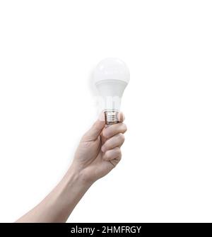Male hand holding a LED light bulb Isolated on white background with clipping path. Environmentally friendly concept. Stock Photo