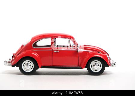 Kostanay, Kazakhstan 2022.Red Volkswagen beetle, retro car on white background Stock Photo