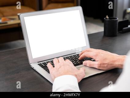Laptop mockup. Man hands typing on keyboard. Online business education or work with computer concept. High quality photo Stock Photo