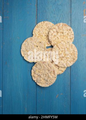 Organic crackers from corn on a wooden background, space for your text Stock Photo