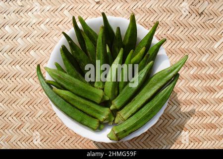 Fresh Okra vegetable or Green vegetables Lady finger or Ladyfingers also known as Bhindi in hindi and urdu. Stock Photo