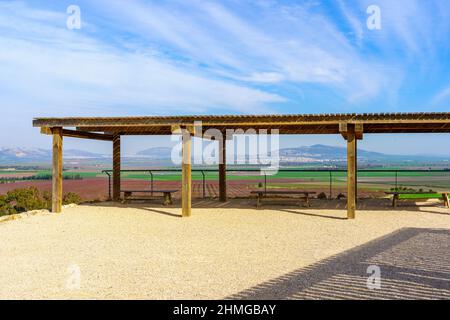 View of and observation deck, the landscape of Jezreel valley countryside, and Mount Tabor, viewed from Megiddo, Northern Israel Stock Photo