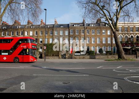 New routemaster bus (no. 59) driving down Kennington Road (including early home of Charlie Chaplin at no. 287), Kennington, London, UK Stock Photo