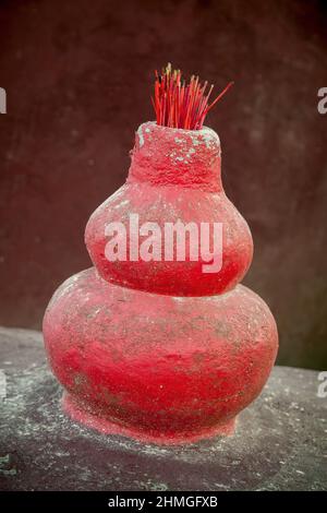 A censer and burned incense sticks, Tin Hau Temple, Nim Shue Wan, Lantau Island, Hong Kong Stock Photo