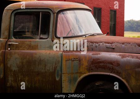 Old rusted farm truck sits in Midvale Maryland with a patina of age and stories to tell. Stock Photo