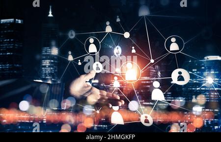 Presenting modern wireless technologies as means of communucation and networking on dark background Stock Photo