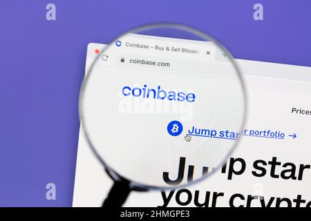 Ostersund, Sweden - Jan 17, 2022: Coinbase website under a magnifying glass. Coinbase is an American company that operates a cryptocurrency exchange p Stock Photo