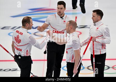 Beijing, China. 10th Feb, 2022. Olympics, Curling, Men, Preliminary Round, 2nd Matchday, Canada - Denmark, Players from Canada in action. Credit: Peter Kneffel/dpa/Alamy Live News Stock Photo