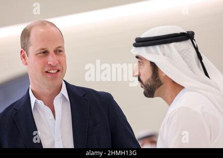 The Duke of Cambridge with His Highness Sheikh Hamdan bin Mohammed bin Rashid Al Maktoum, Crown Prince of Dubai during his visit to the UK Pavilion at Expo2020 in Dubai, as part of his tour of the United Arab Emirates. Picture date: Thursday February 10, 2022. Stock Photo