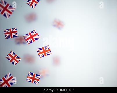 Great Britain, national holiday country. Mini flags on a transparent foggy background. concept patriotism, pride and freedom. Platinum Jubilee of Stock Photo