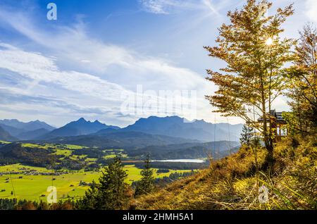 View from Krepelschrofen in Wallgau over the Barmsee to the Wetterstein Mountains in sunshine, Sonnenstern, Bavaria, Germany Stock Photo