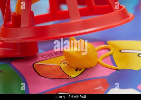 Close up photograph of playing pieces on a Mouse Trap board game. Stock Photo