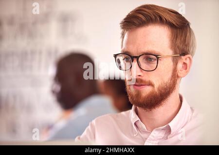 Businessman With Laptop Working On Table In Office Coffee Shop Stock Photo