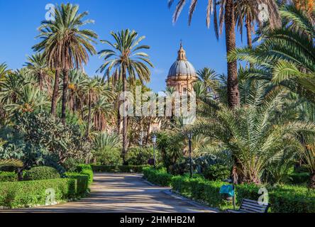 Path in the park Villa Bonanno with the dome of the cathedral in the old town, Palermo, Sicily, Italy Stock Photo