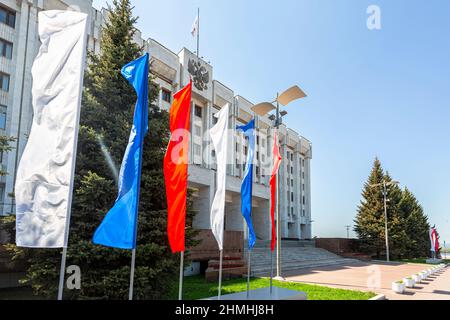 Samara, Russia - May 10, 2019: Colorfuls flags next the administrative building of Samara region government in summer day Stock Photo