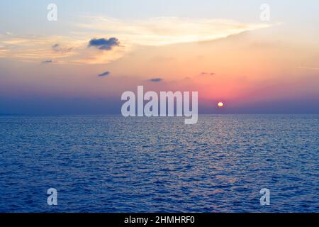 Impressive pictures of nature. Sunset over the Indian Ocean. Stock Photo