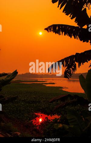 Dramatical colorful sunset in winter. This image was captured by me on January 31, 2022, from Kolatia, Bangladesh, South Asia Stock Photo