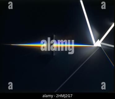White Light passing through Glass Prism to form Colour Spectrum Stock Photo