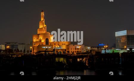 Doha,qatar- December 14,2021 : view of doha corniche during night along with fanar building. Stock Photo