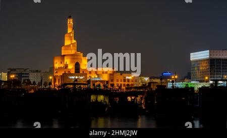 Doha,qatar- December 14,2021 : view of doha corniche during night along with fanar building. Stock Photo