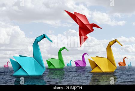 Changing your life concept and fearless courage symbol as diverse origami swans floating on water with a confident bird rising up and flying away. Stock Photo