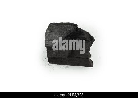 Black oak coal isolated on a white background. Stock Photo