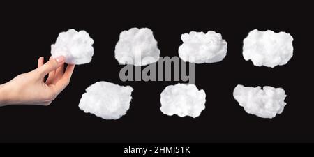 Cotton clouds set isolated on black background. Hand holding white cloud. Surrealism style. High quality photo Stock Photo