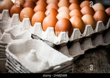 Free range chicken eggs on trays in a farm shop Stock Photo