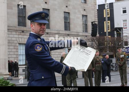 A copy of the 1916 proclamation is held up for photographers after a reading at the Easter 1916 Commemorative ceremony in Dublin, Ireland Stock Photo