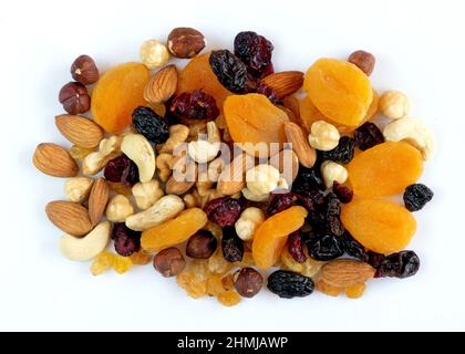 Dried fruits and nuts on white background Stock Photo