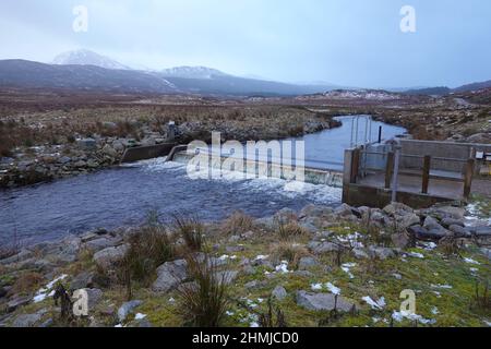 Weir on small hyro system near Bridge of Gaur, Perthshire, Scottish Highlands, United Kingdom Stock Photo