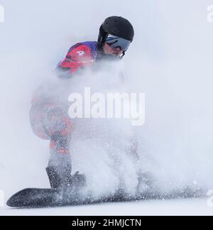 Zhangjiakou, China's Hebei Province. 10th Feb, 2022. Alessandro Haemmerle of Austria competes during men's snowboard cross finals at Genting Snow Park in Zhangjiakou, north China's Hebei Province, Feb. 10, 2022. Credit: Ding Ting/Xinhua/Alamy Live News Stock Photo