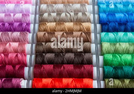 Sewing thread rolls in different colors Stock Photo