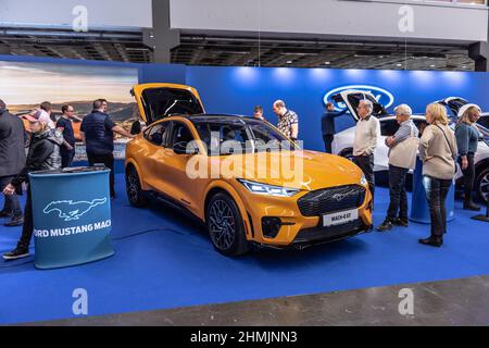 Gothenburg, Sweden - december 05 2021: Cyber orange 2022 Ford Mustang Mach-E GT electric SUV on display Stock Photo