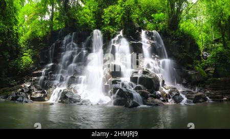Panoramic view. Kanto Lampo Waterfall in jungle Ubud, Bali island Indonesia. Wallpaper background. Natural scenery. Stock Photo