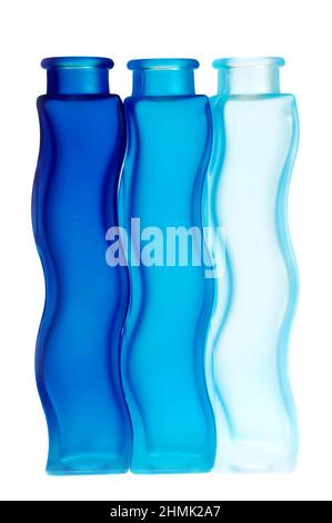 Blue bottles in a row Stock Photo