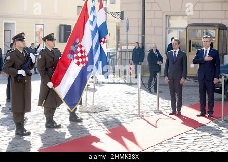 (220210) -- ZAGREB, Feb. 10, 2022 (Xinhua) -- Croatian Prime Minister Andrej Plenkovic (1st R) welcomes Greek Prime Minister Kyriakos Mitsotakis (2nd R) in Zagreb, Croatia, on Feb. 10, 2022. Croatian Prime Minister Andrej Plenkovic and his Greek counterpart Kyriakos Mitsotakis on Thursday called for reducing tensions between Ukraine and Russia and supported diplomatic efforts by the international community. (Patrik Macek/PIXSELL via Xinhua) Stock Photo