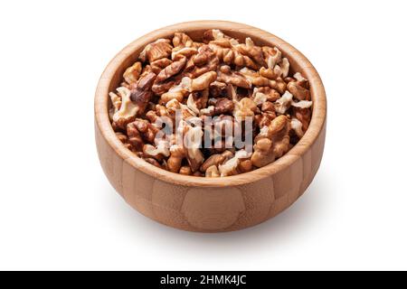 Organic raw walnuts in wooden bowl isolated on white background. Stock Photo