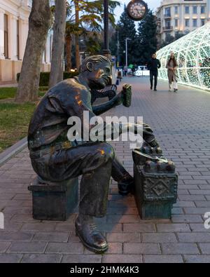 Baku, Azerbaijan - January 03 2022- Shoeshiner statue just near Caspian sea. Stock Photo