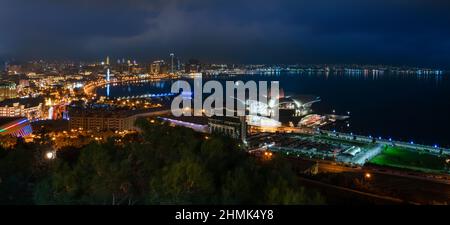 Baku, Azerbaijan - January 03 2022- Panoramic city view with Caspian Sea at night. Stock Photo