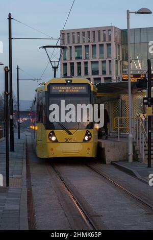 Manchester Metrolink tram 3094 at Rochdale town centre tram stop at night. Stock Photo