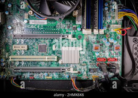 the mainboard of a computer is corroded due to water penetration Stock ...