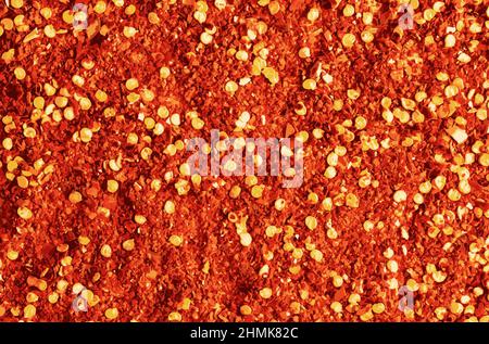 Realistic illustration of crushed dry chili peppers background. Stock Vector