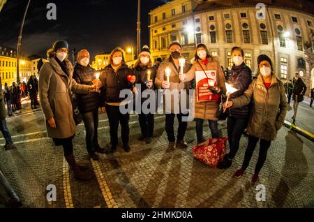 Munich, Bavaria, Germany. 10th Feb, 2022. After at least a year of near silence by Muenchen ist Bunt and other groups, a new association in the city of Munich, Germany organized the 'Muenchen wird sichtbar'' demonstration for solidarity, democracy, the victims of the Coronavirus/Covid-19 crisis, and against the so-called Coronarebels and conspiracy extremists who have been taking over the streets of the city at night and sometimes rioting against police as part of their 'Spaziergaenge''. The group, under Maria 2.0's Katrin Richthofer, appeared to prioritize painstakingly creating t Stock Photo