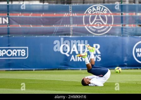 Kylian Mbappe of PSG falls during a training session at the Camp des Loges in Saint-Germain-en-Laye, near Paris, France on August 28, 2021. Stock Photo